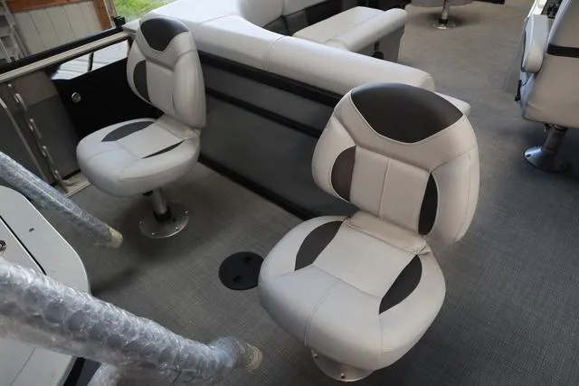 Slide: The Image of 2024 Bentley Pontoons Fish 200 4-Point interior with swivel seats and modern design. - 20