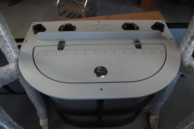 Slide: The Image of 2024 Bentley Pontoons Fish 200 4-Point fishing station with measuring ruler and cup holders. - 22