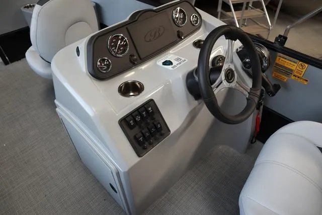 Slide: The Image of 2024 Bentley Pontoons Fish 200 4-Point dashboard with steering wheel and controls. - 24