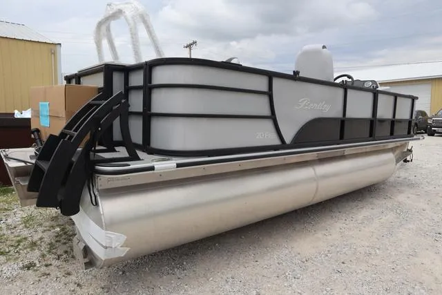 Slide: The Image of 2024 Bentley Pontoons Fish 200 4-Point pontoon boat on gravel lot. - 28
