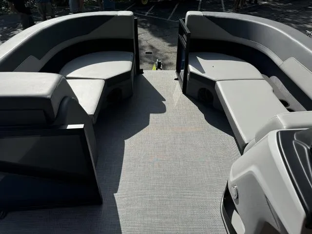 Slide: The Image of 2025 Lowe LS 190 boat interior with gray seating and flooring. - 4