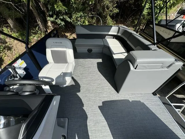 Slide: The Image of Pontoon boat interior with gray seating, 2025 Lowe LS 190 model. - 5