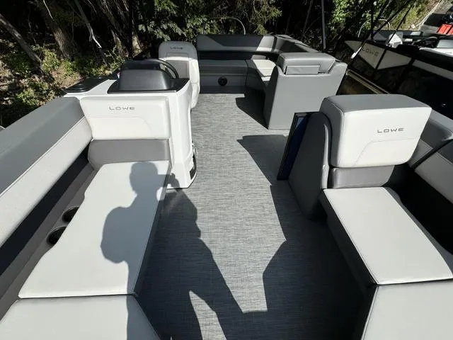 Slide: The Image of 2025 Lowe LS 190 boat interior with gray seating and spacious layout. - 6