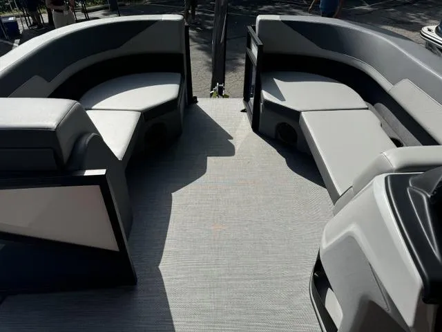 Slide: The Image of Interior of a 2025 Lowe LS 190 boat with gray seating and flooring. - 6
