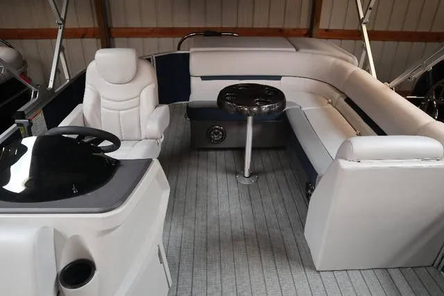 Slide: The Image of 2023 Godfrey Sweetwater 2286 Cruise interior with seating and steering console. - 4