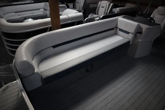 Slide: The Image of 2023 Godfrey Sweetwater 2286 Cruise boat interior with sleek seating and modern design. - 7