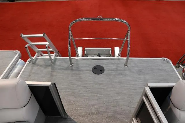 Slide: The Image of 2024 Godfrey Sweetwater 2286 SB Triple Tube Back Porch with ladder on red carpet. - 10