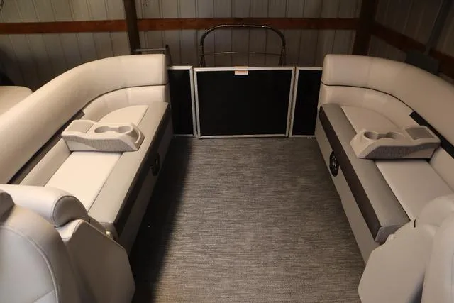 Slide: The Image of 2024 Godfrey Sweetwater 2286 SB Triple Tube Back Porch interior with cushioned seating and cup holders. - 14