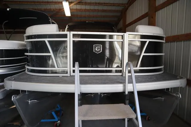 Slide: The Image of 2024 Godfrey Sweetwater 2286 SB Triple Tube Back Porch pontoon boat in storage. - 18