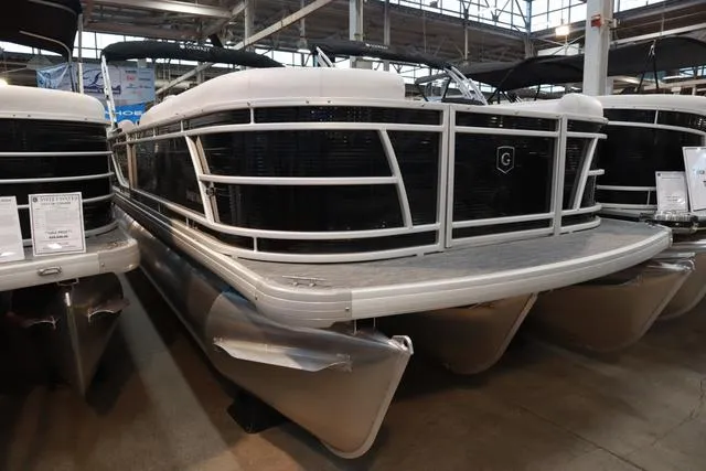 Slide: The Image of 2024 Godfrey Sweetwater 2286 SB Triple Tube pontoon boat displayed indoors. - 19