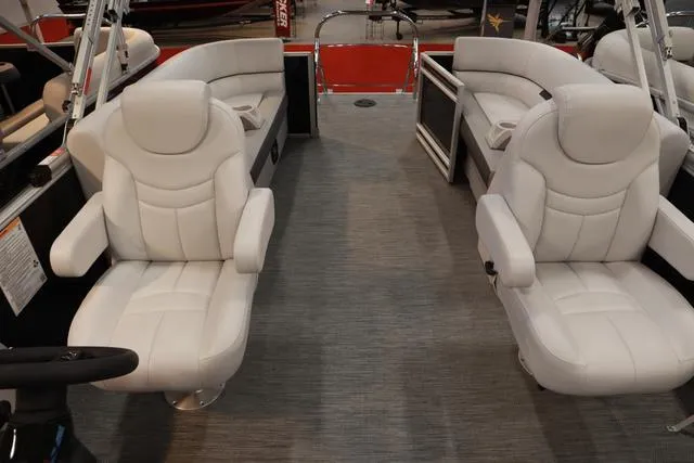 Slide: The Image of 2024 Godfrey Sweetwater 2286 SB boat interior with plush white seating. - 6