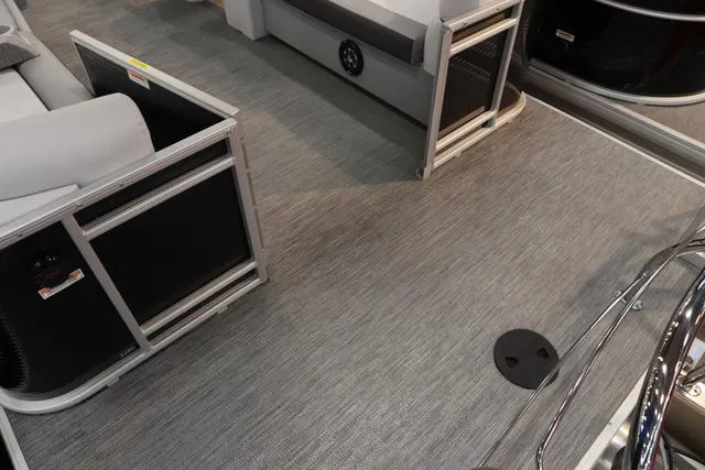 Slide: The Image of 2024 Godfrey Sweetwater 2286 SB Triple Tube Back Porch interior with gray flooring and seating. - 9