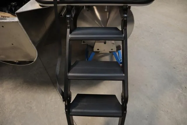 Slide: The Image of 2025 Bentley Pontoons Legacy 223 Swingback Triple Tube Pkg ladder detail. - 22