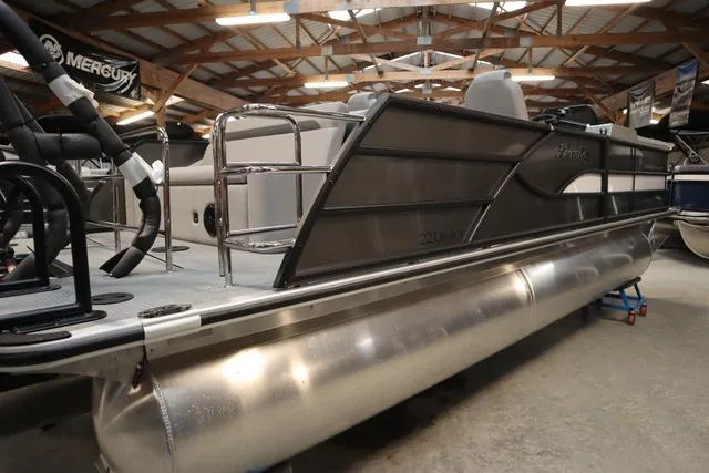 Slide: The Image of 2025 Bentley Pontoons Legacy 223 Swingback Triple Tube in showroom. - 24