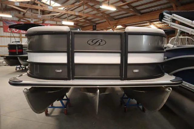 Slide: The Image of 2025 Bentley Pontoons Legacy 223 Swingback Triple Tube in a showroom. - 4