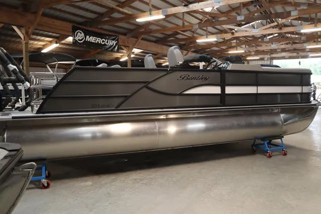 Slide: The Image of 2025 Bentley Pontoons Legacy 223 Swingback Triple Tube in showroom. - 5