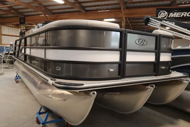Slide: The Image of 2025 Bentley Pontoons Legacy 223 Swingback Triple Tube in showroom. - 6
