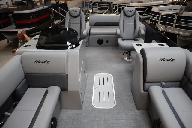 Slide: The Image of 2025 Bentley Pontoons Legacy 223 Swingback interior with luxurious seating and modern design. - 7