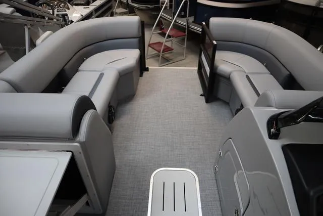 Slide: The Image of 2025 Bentley Pontoons Legacy 223 Swingback interior with gray seating and modern design. - 9