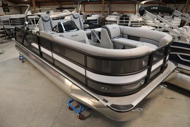 Slide: The Image of 2025 Bentley Pontoons Legacy 223 Swingback Triple Tube in showroom. - 9