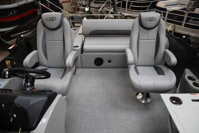 Slide: The Image of 2025 Bentley Pontoons Legacy 223 interior with plush seating and modern design. - 3