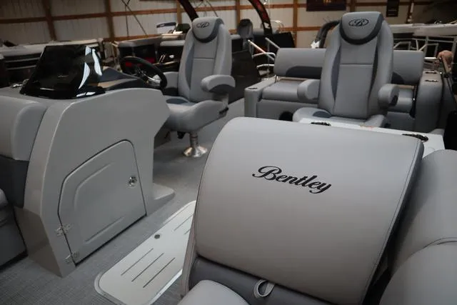 Slide: The Image of 2025 Bentley Pontoons Legacy 223 Swingback interior with luxurious seating and modern design. - 5
