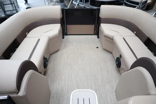 Slide: The Image of 2025 Bentley Pontoons Legacy 223 Navigator Sport Tube interior with beige seating. - 4