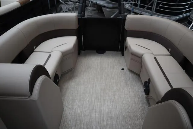 Slide: The Image of 2025 Bentley Pontoons Legacy 223 Navigator Sport Tube interior with plush seating. - 9