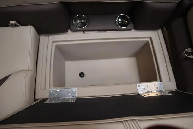 Slide: The Image of 2024 Bentley Pontoons Legacy 220 Navigator interior with plush seating and modern dashboard. - 7