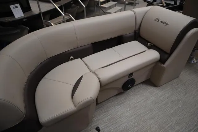Slide: The Image of 2024 Bentley Pontoons Legacy 220 Navigator interior with spacious seating and modern design. - 8