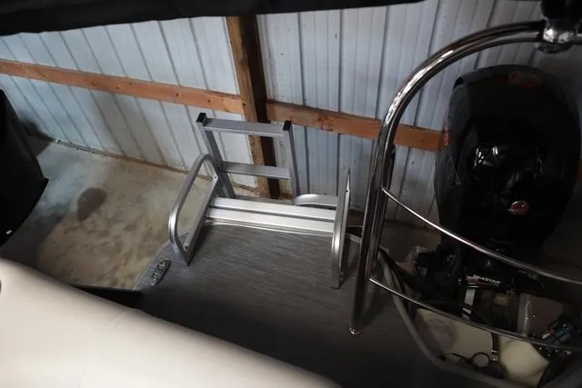 Slide: The Image of 2025 Lowe SS 230 WV boat interior with spacious seating and modern design. - 7