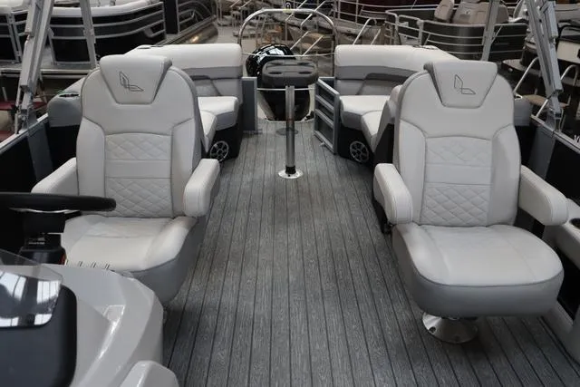 Slide: The Image of 2025 Lowe SS 230 WT Triple Tube Package interior with luxurious seating and modern design. - 8