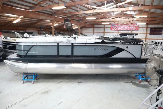 Slide: The Image of 2024 Godfrey Sweetwater 2286 SFL Triple Tube pontoon boat in a showroom. - 4