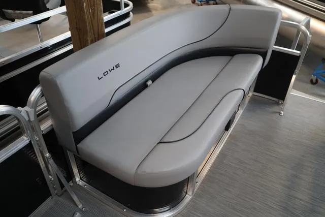 Slide: The Image of 2023 Lowe Ultra Cruise 160 boat interior with sleek gray seating. - 3