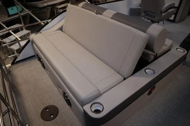 Slide: The Image of 2025 Bentley Pontoons Elite 253 Swingback interior seating with cup holders. - 23