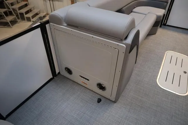 Slide: The Image of 2025 Bentley Pontoons Elite 253 interior with gray seating and modern design. - 27