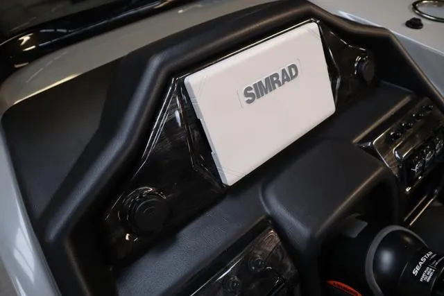 Slide: The Image of Dashboard of 2025 Bentley Pontoons Elite 253 with Simrad navigation system. - 28