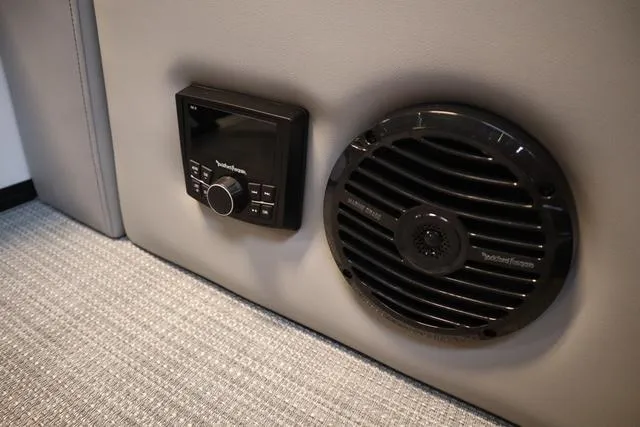 Slide: The Image of 2025 Bentley Pontoons Elite 253 audio system with control panel and speaker. - 30