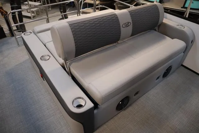 Slide: The Image of 2025 Bentley Pontoons Elite 253 Swingback Triple Tube seating with cup holders and quilted upholstery. - 35