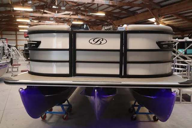 Slide: The Image of 2025 Bentley Pontoons Elite 253 Swingback Triple Tube in a warehouse setting. - 45