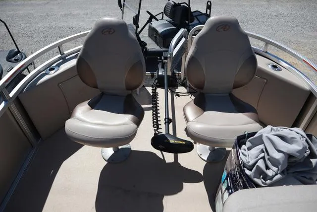 Slide: The Image of 2013 Avalon 1670 Fish boat interior with two swivel seats and fishing equipment. - 4
