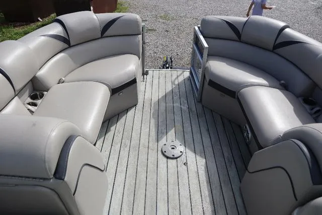 Slide: The Image of 2017 Berkshire 23 E STS pontoon boat interior with gray seating and deck. - 5