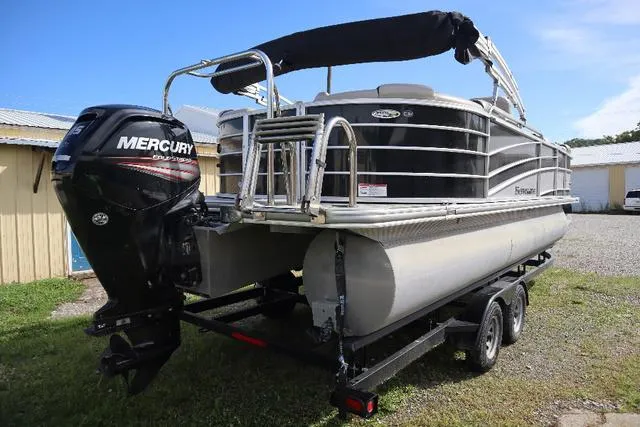 Slide: The Image of 2017 Berkshire 23 E STS pontoon boat with Mercury outboard engine on trailer. - 6