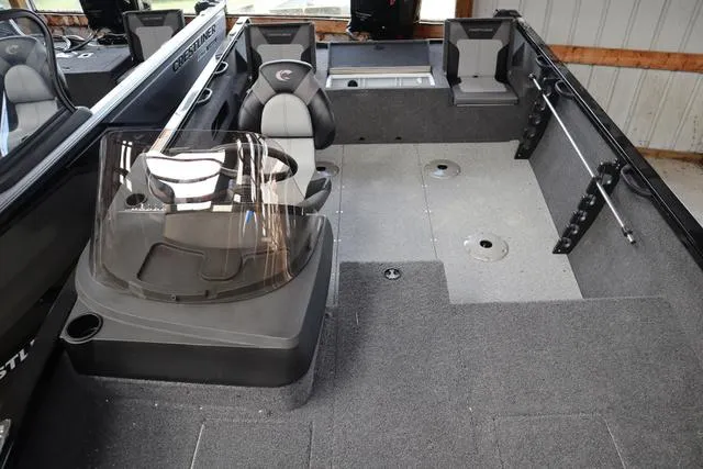 Slide: The Image of 2025 Crestliner 1750 HAWK SC JS boat interior with seating and steering console. - 5