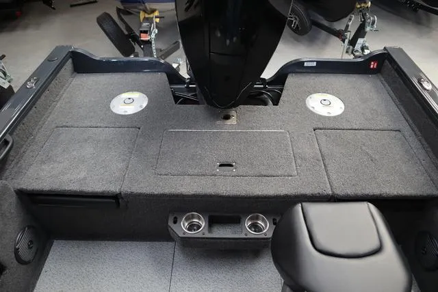 Slide: The Image of 2025 Crestliner 1850 Fish Hawk WT JS boat interior with carpeted deck and seating. - 6