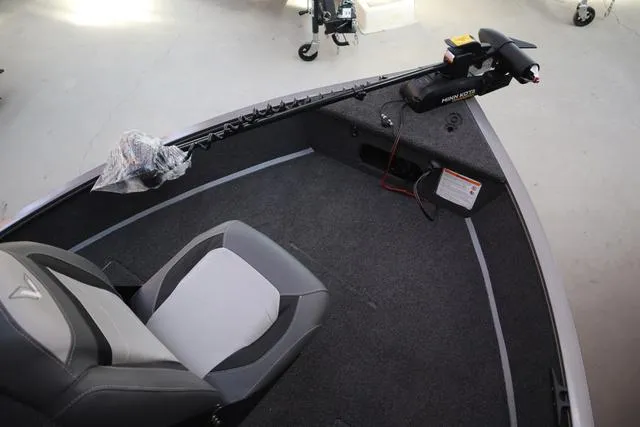 Slide: The Image of 2025 Lowe FM 1775 WT boat interior with trolling motor and seating. - 19