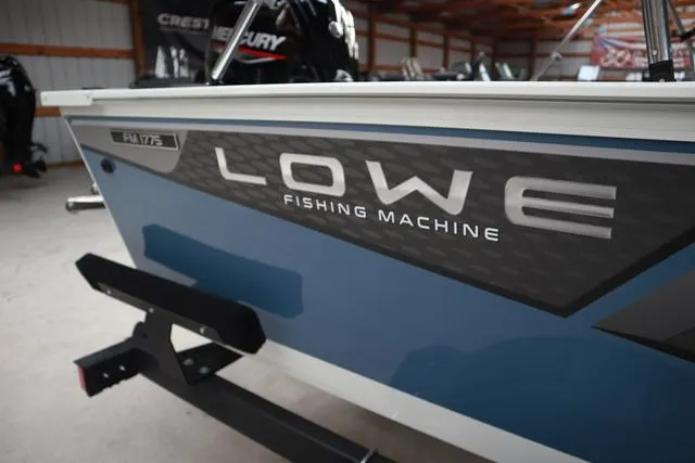 Slide: The Image of 2025 Lowe FM 1775 WT Fishing Machine boat in showroom. - 5