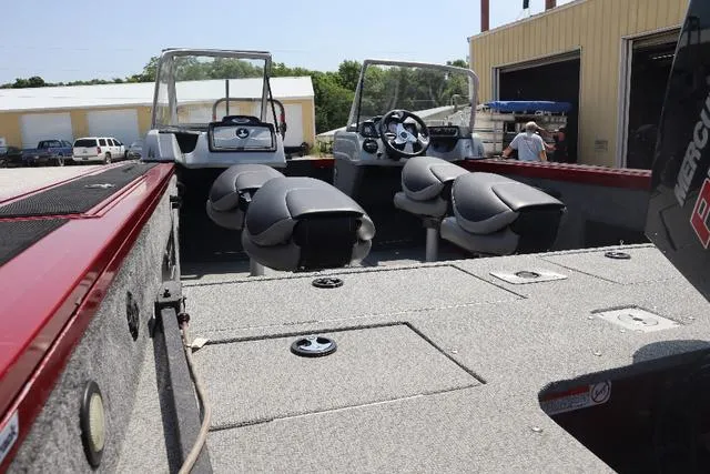 Slide: The Image of 2019 Tracker Targa™ V-18 Combo boat interior with seating and steering console. - 7