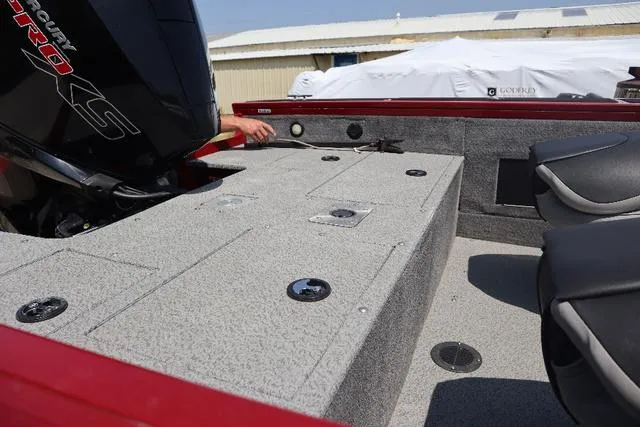 Slide: The Image of 2019 Tracker Targa™ V-18 Combo boat interior with storage compartments and seating. - 8