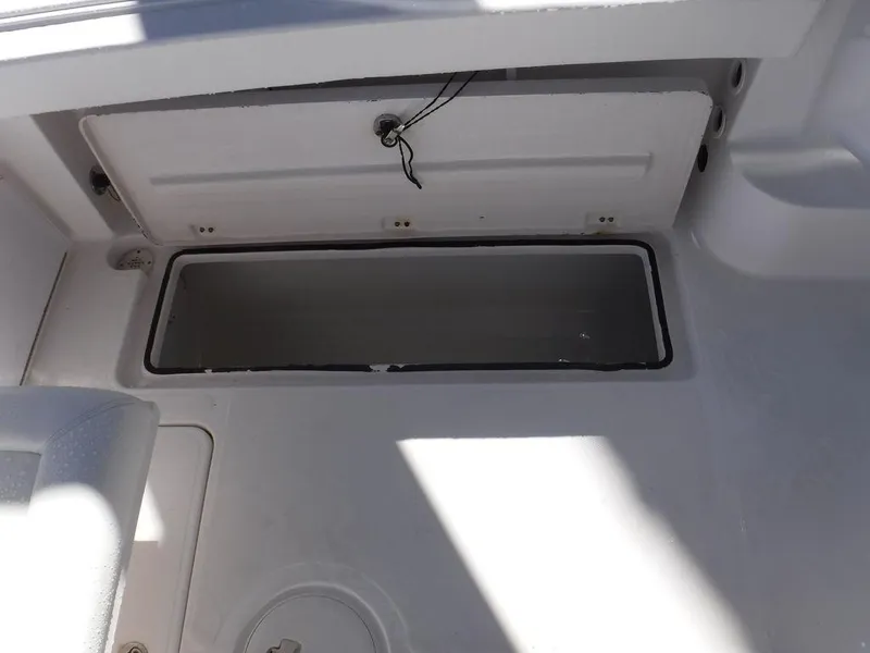 Slide: The Image of 2008 Pro-Line 26 XP boat storage compartment, open and empty. - 15
